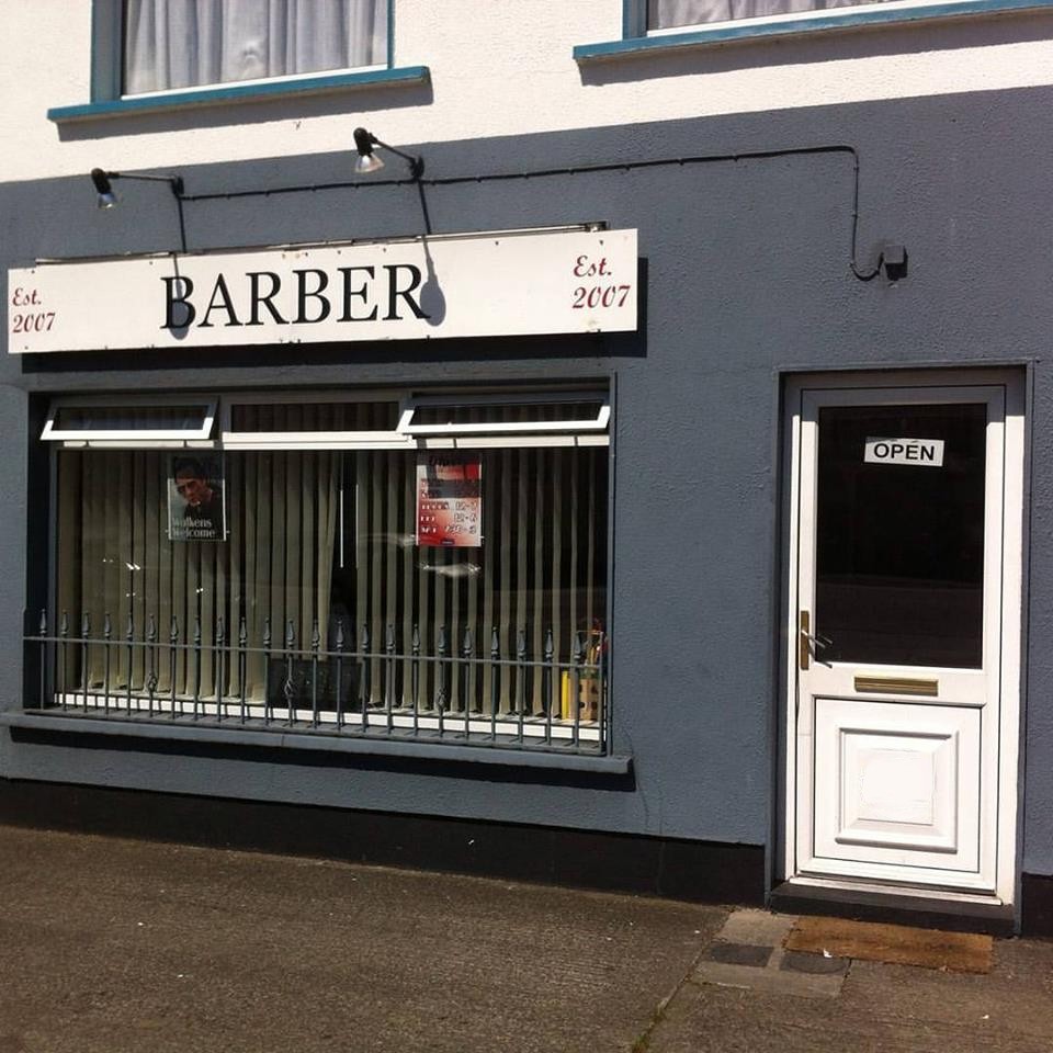 The O'Neill's Clip Joint shopfront on Main Street, Ballivor — BARBER sign, Est. 2007